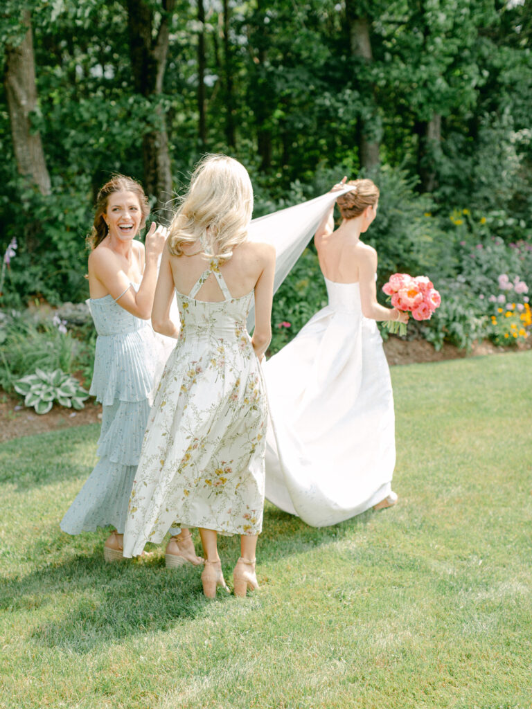 Bridesmaids lead bride to her first look